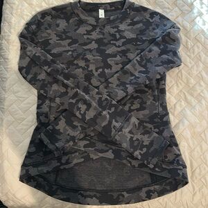 Women’s Lululemon. Long sleeve shirt with thumb holes. Size 10.